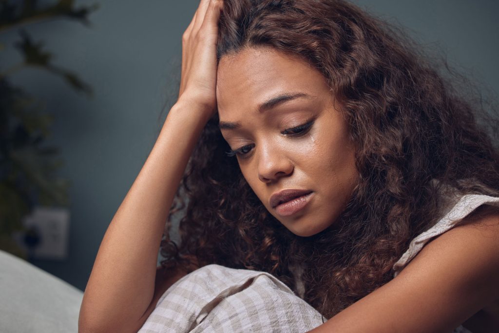 Stressed and crying woman.
