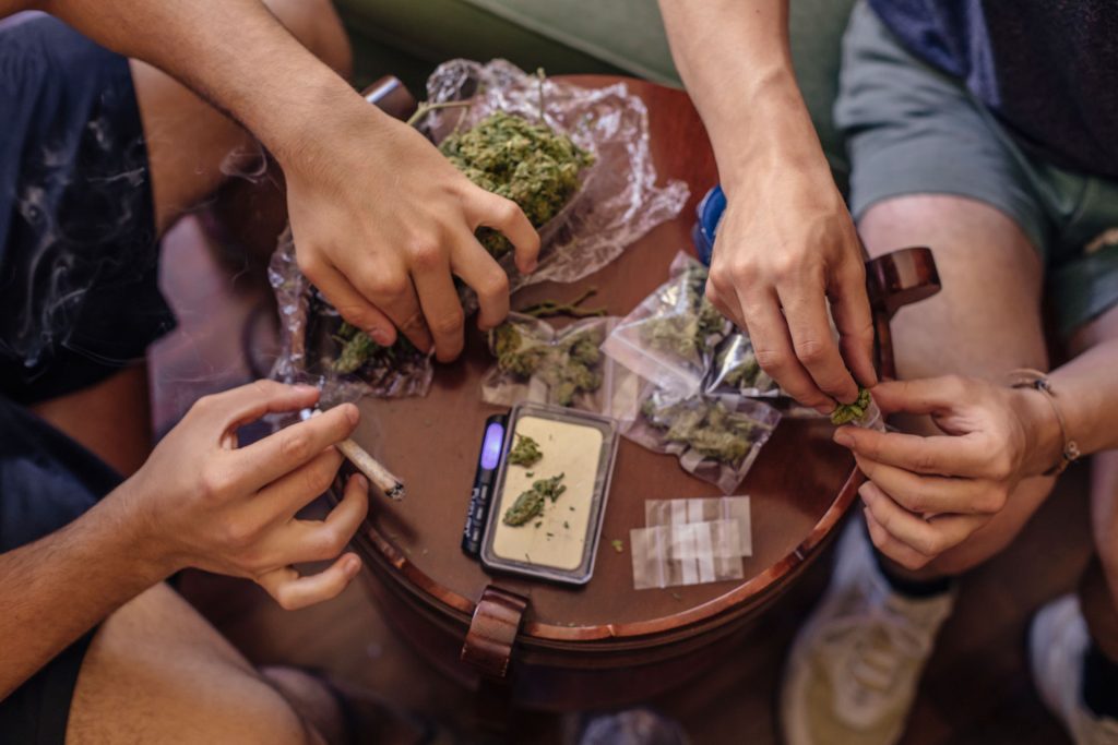 Man with marijuana dependency packing.