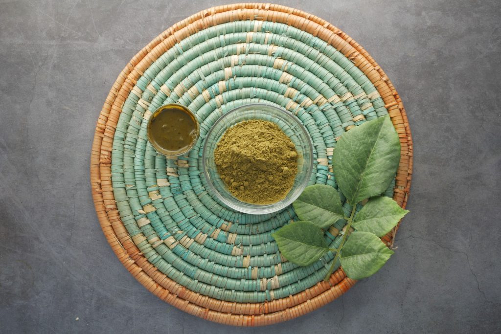 Wooden bowl with kratom.