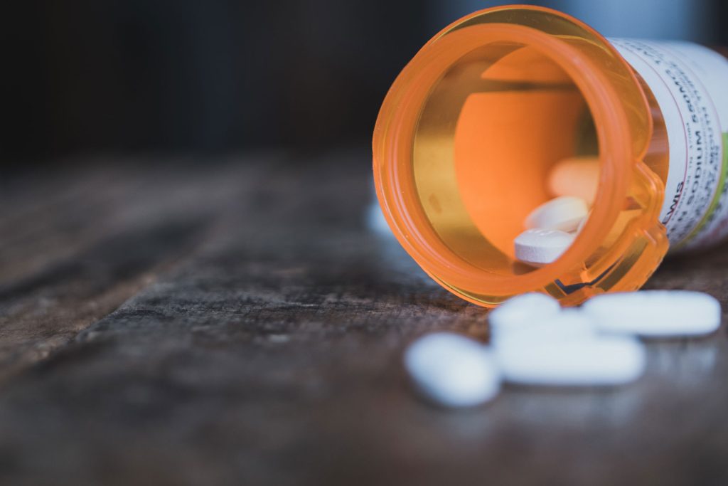 Selective focus shot of white pills.