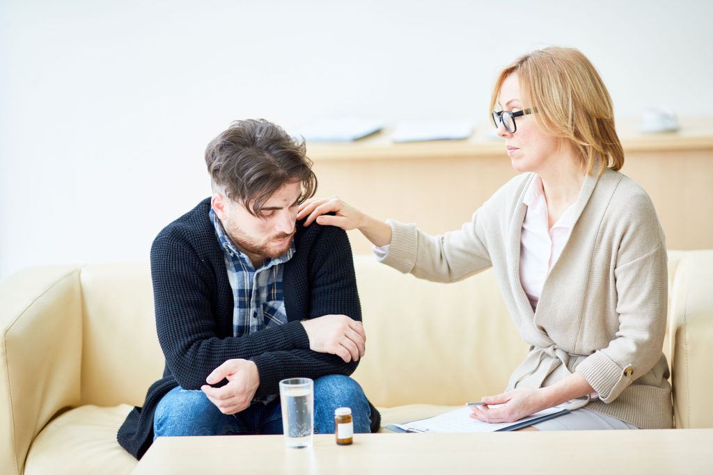 Young man attending addiction treatment program.
