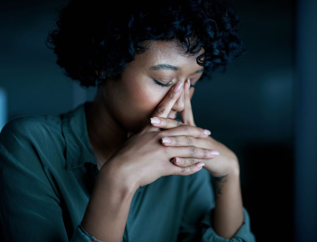 Woman looking depressed.