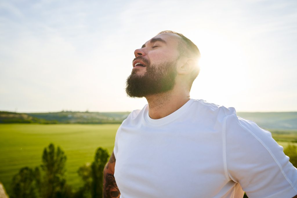 Young bearded man outdoor.